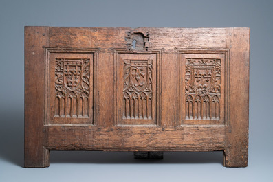 A carved oak front panel of a coffer with the arms of France and the Dauphin, France, 2nd half 15th C.