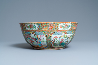 A large Chinese Canton famille rose bowl on wooden stand, 19th C.