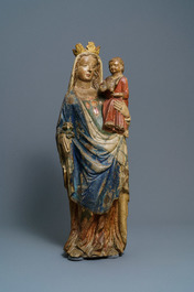 A large polychromed limestone figure of a Madonna with child, Champagne or Lorraine province, France, 2nd half 14th C.