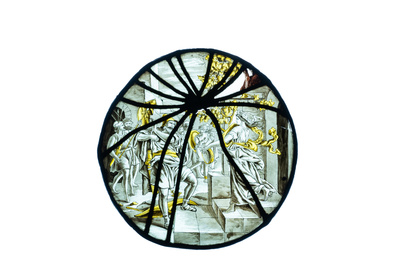 A pair of grisaille and silver yellow painted glass roundels with biblical scenes, France, 17th C.