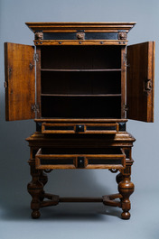 An oak and ebony two-door cabinet, The Low Countries, 17th C.