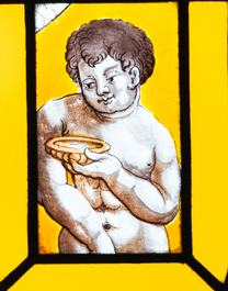 A composite stained and painted glass window mounted in lead alloy, France, 16th C.