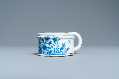 A varied collection of Dutch Delft blue and white and polychrome pottery, 18th C.