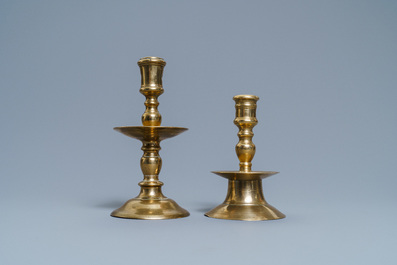 A Flemish bronze capstan candlestick and a disc candlestick, 16/17th C.