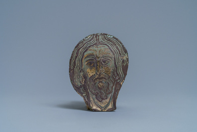 A Romanesque painted glass fragment depicting the head of Christ, France, 11/12th C.