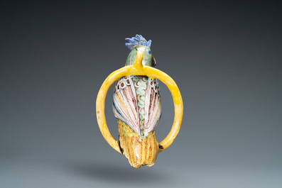 A polychrome Dutch Delft model of a parrot on a ring, 18th C.