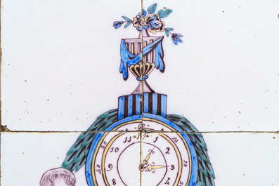 A polychrome Dutch Delft tile mural with a clock, late 18th C.