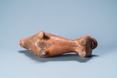 A lion-shaped pebble-inlaid stoneware oil lamp or ewer, Badajoz, Portugal, 15/16th C.