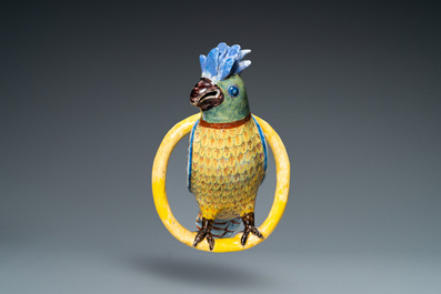 A polychrome Dutch Delft model of a parrot on a ring, 18th C.
