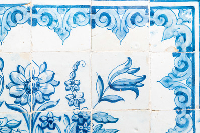 A blue and white Portuguese tile mural depicting an urn filled with flowers and fruits, 18th C.