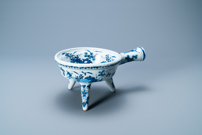 A rare Dutch Delft blue and white warming bowl with the arms of the Austrian von Zinzendorf family, late 17th C.