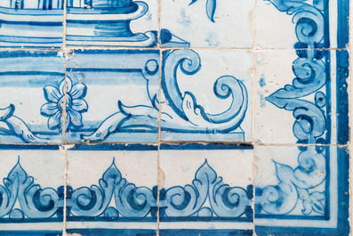 A blue and white Portuguese tile mural depicting an urn filled with flowers and fruits, 18th C.