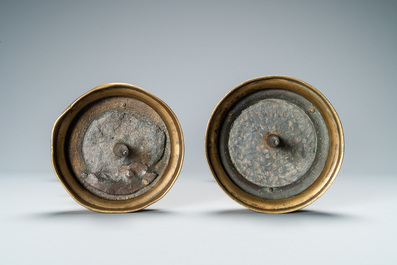 A composite pair of brass alloy candlesticks, Germany, 16th C.