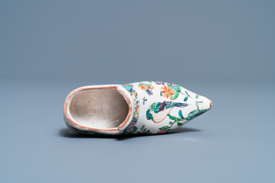 A polychrome petit feu and gilded Dutch Delft covered vase, a shoe and a pair of cashmere palette covered vases, 18/19th C.