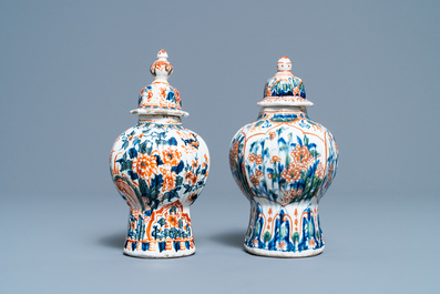 A polychrome petit feu and gilded Dutch Delft covered vase, a shoe and a pair of cashmere palette covered vases, 18/19th C.