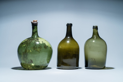 Three large green glass bottles, 18th C.