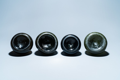 Four green glass wine bottles, 17/18th C.