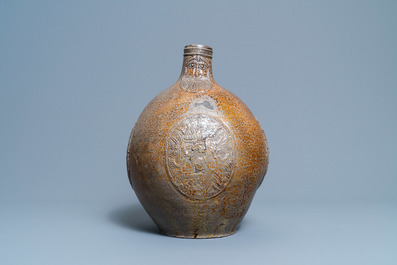 A large German stoneware bellarmine jug with three armorial medallions, Frechen, 1st half 17th C.