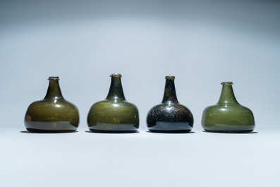 Four green glass wine bottles, 17/18th C.