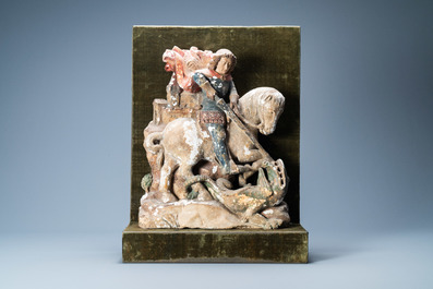 A polychromed stone group of Saint George slaying the dragon, probably Germany, 15th C.