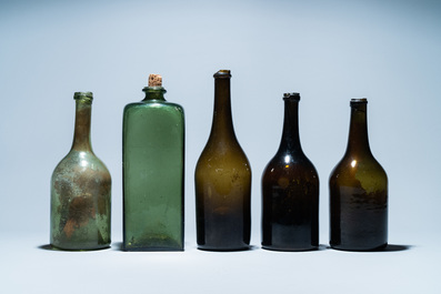 Five green glass bottles, 17/18th C.