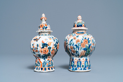 A polychrome petit feu and gilded Dutch Delft covered vase, a shoe and a pair of cashmere palette covered vases, 18/19th C.