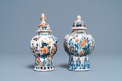 A polychrome petit feu and gilded Dutch Delft covered vase, a shoe and a pair of cashmere palette covered vases, 18/19th C.