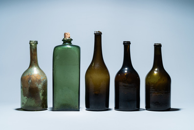 Five green glass bottles, 17/18th C.