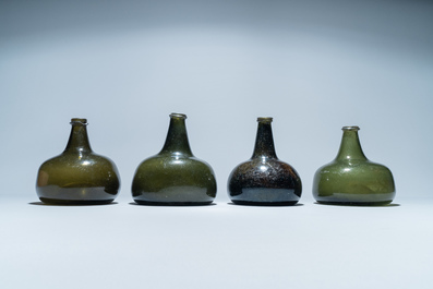 Four green glass wine bottles, 17/18th C.