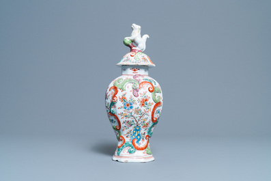 A polychrome petit feu and gilded Dutch Delft covered vase, a shoe and a pair of cashmere palette covered vases, 18/19th C.