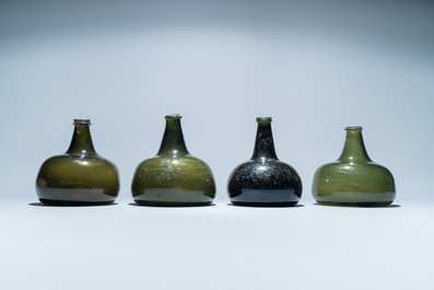 Four green glass wine bottles, 17/18th C.