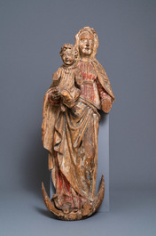 A large polychromed limewood figure of a Madonna with child, Germany, 15th C.