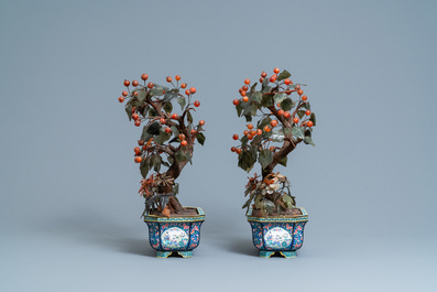 A pair of large Chinese Canton enamel jardini&egrave;res with jade and hardstone trees, 19th C.