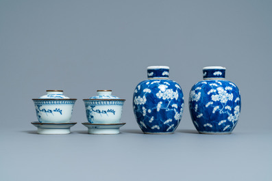 A pair of Chinese blue and white covered bowls on stands and a pair of covered jars, 19th C.