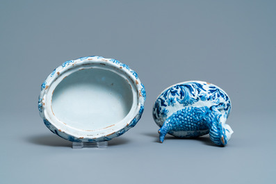 A Dutch Delft blue and white butter tub in the shape of a mermaid, 18th C.