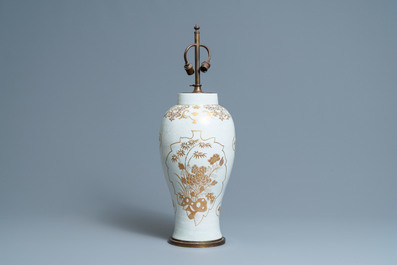A Chinese parcel-gilt bianco-sopra-bianco vase mounted as a lamp, Qianlong