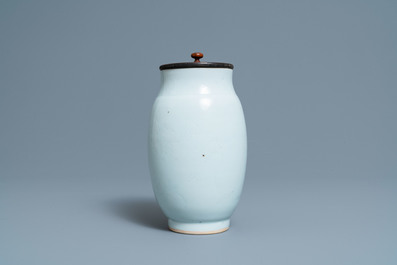 A Chinese monochrome white vase with an incised design of birds, Transitional period