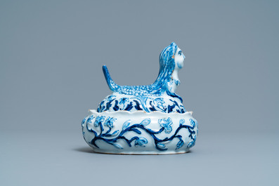 A Dutch Delft blue and white butter tub in the shape of a mermaid, 18th C.