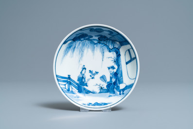 Two Japanese blue and white Arita plates and a cup and saucer, Edo, 17/18th C.