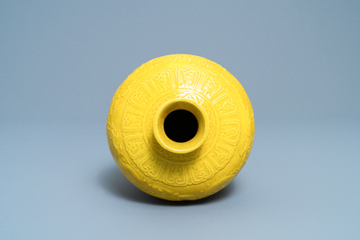 A Chinese relief-molded monochrome yellow 'meiping' 'dragon' vase, Republic