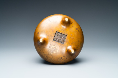 A Chinese bronze tripod censer, Xuande mark, 18th C.