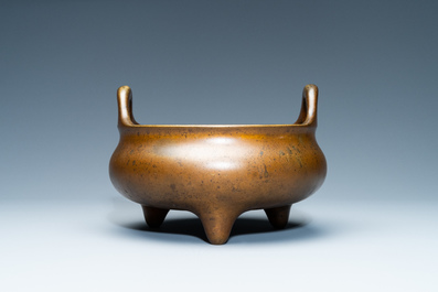 A Chinese bronze tripod censer, Xuande mark, 18th C.