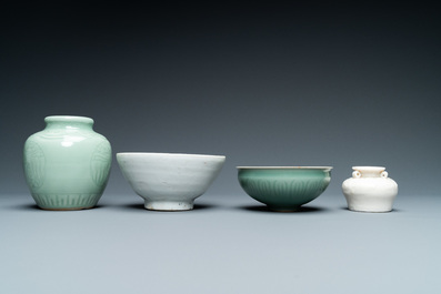 Three Chinese monochrome celadon and blanc de Chine vases and two bowls, 19/20th C.
