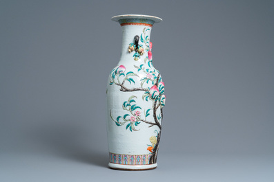 Een Chinese famille rose 'negen perziken' vaas met reli&euml;fdecor, 19e eeuw