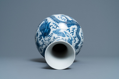 A Chinese blue and white 'dragon and phoenix' vase, Qianlong mark, 19/20th C.