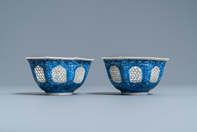 A pair of Chinese blue and white reticulated octagonal bowls, Kangxi