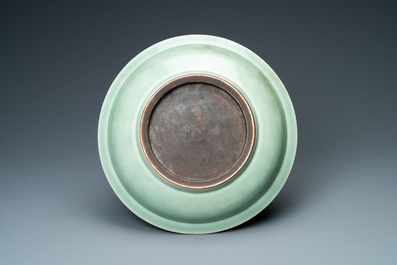 A Chinese monochrome celadon 'lotus' dish, Qianlong