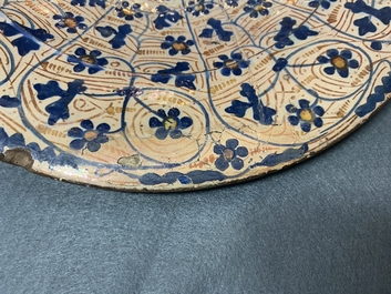 A Hispano-Moresque 'IHS' lusterware dish, Manises, Spain, 15th C.