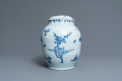 A Chinese blue and white vase and cover with floral sprigs, Transitional period