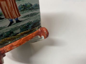 A polychrome Dutch Delft petit feu pipe stand modelled as a sleigh, 18th C.